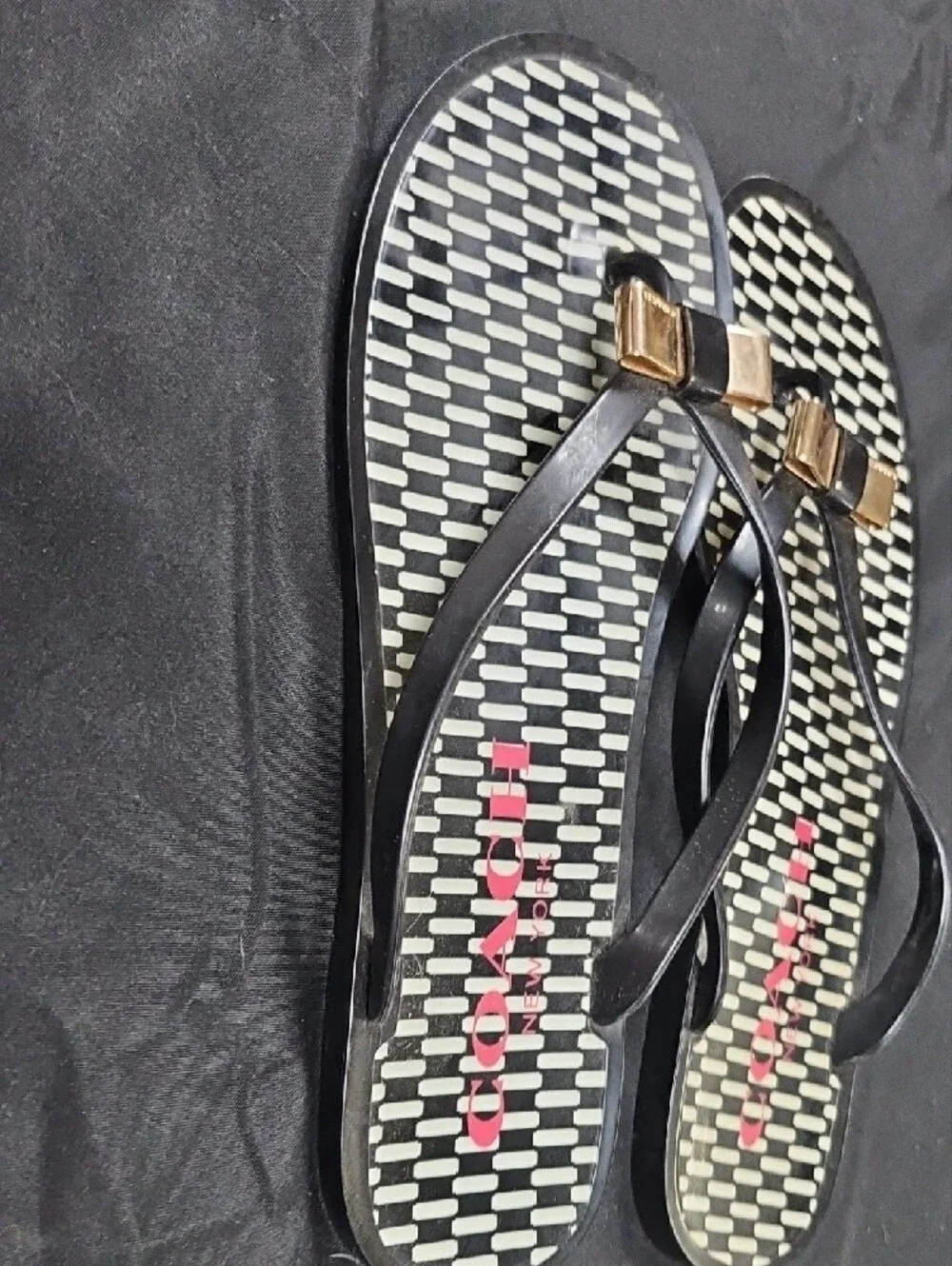 Coach Black Flip Flop Sandals with Gold Bow Accent